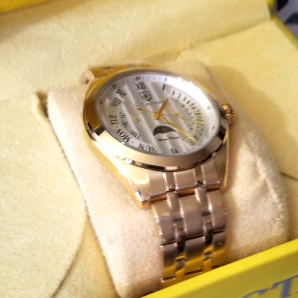 S. COIFMAN  MENS GOLD WATCH